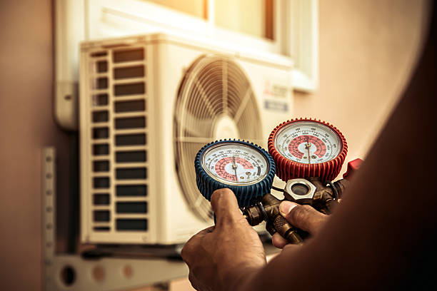 Professional Heat Pump Repair technician working in Somerville, IN